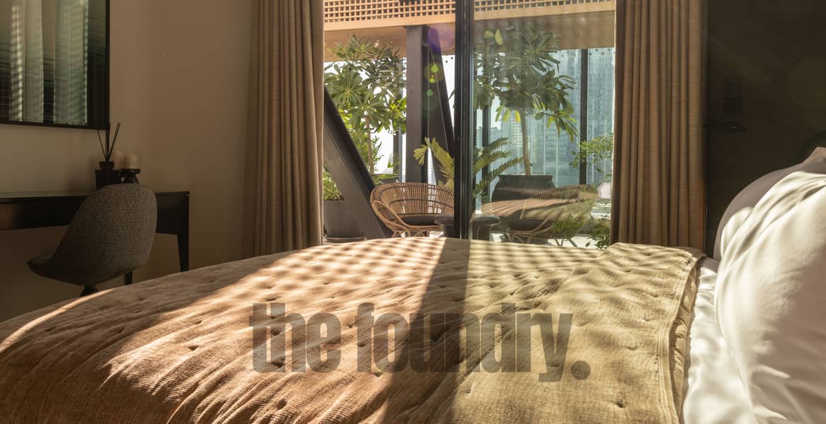 48 The OPUS Penthouse by OMNIYAT Guest Bedroom 2. jpg