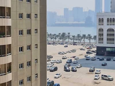 2 Bedroom Flat for Rent in Al Khan, Sharjah - 2BHK + Built-in Wardrobes | Free Maintenance + Parking | Very Close to Dubai – Al Khan