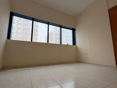 2 Bedroom Apartment for Rent in Rolla Area, Sharjah - 2 BHK With Balcony | First Tenant + Free Maintenance | Close to the Corniche – Al Rolla