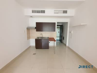 Studio for Rent in Jumeirah Village Circle (JVC), Dubai - Community View | Low floor | Unfurnished  |Balcony