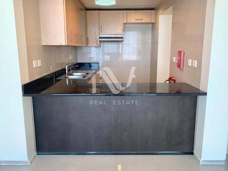 9 Sun Tower 2BR, Al Reem Island - 177968314612_0003_remove 7. jpg