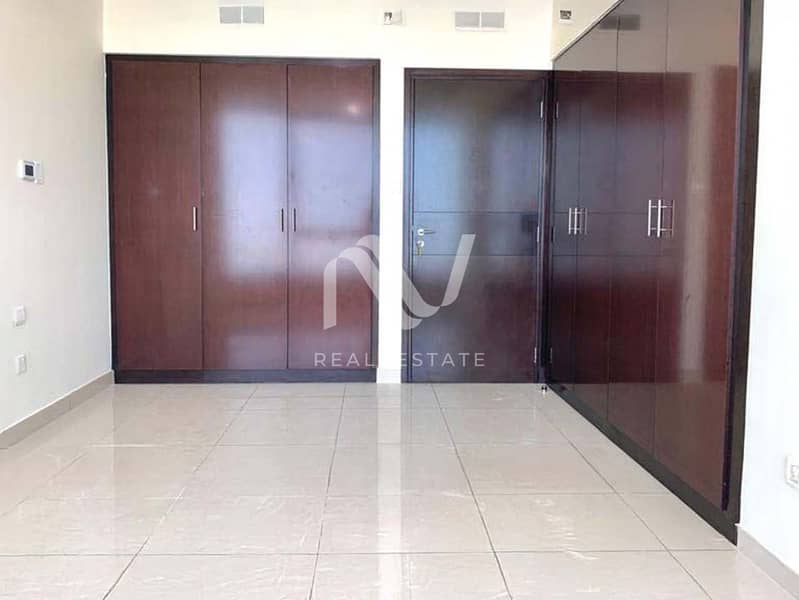 7 Sun Tower 2BR, Al Reem Island - 177968314612_0006_remove 11. jpg