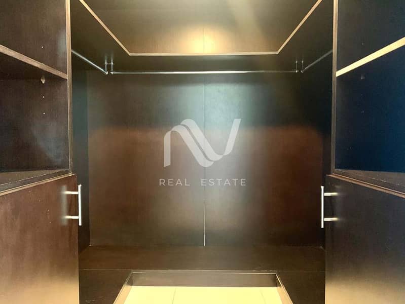 10 Sun Tower 2BR, Al Reem Island - 177968314612_0004_remove 13. jpg