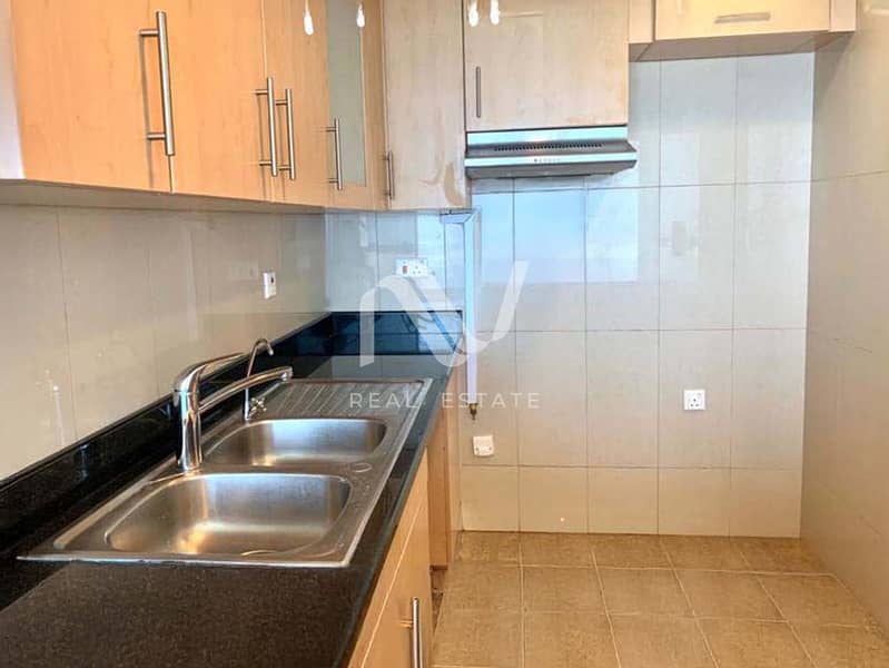 11 Sun Tower 2BR, Al Reem Island - 177968314612_0002_remove 4. jpg