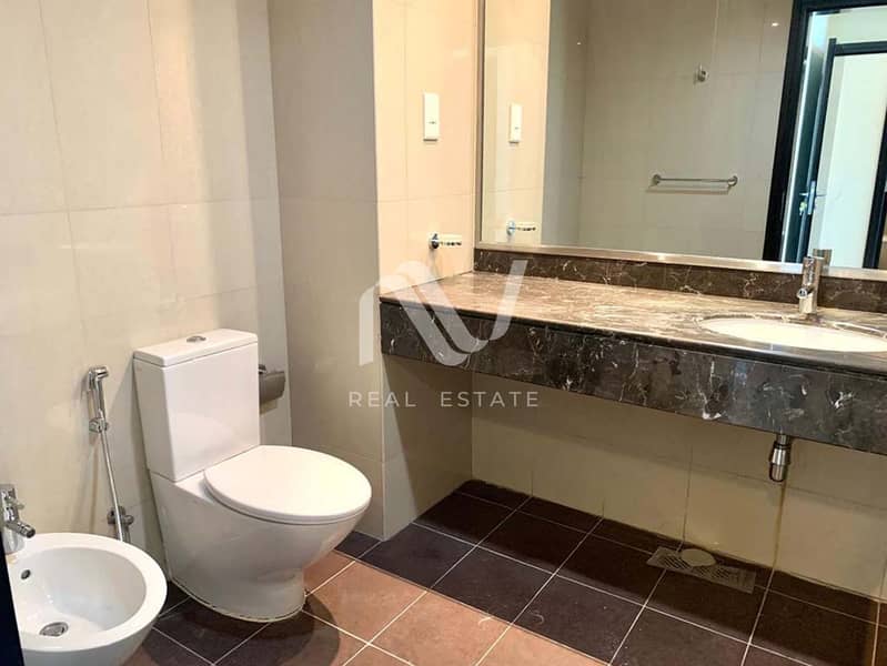 14 Sun Tower 2BR, Al Reem Island - 177968314612_0013_remove 19. jpg