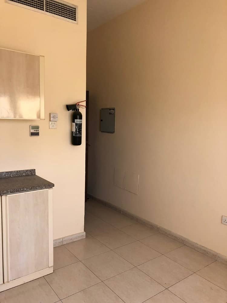 For rent studio in a building in the Ajman shelf area on a street close to Nesto