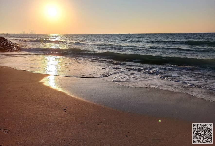 large_Sunrise_At_Ajman_Beach. jpg large_Sunrise_At_Ajman_Beach. jpg