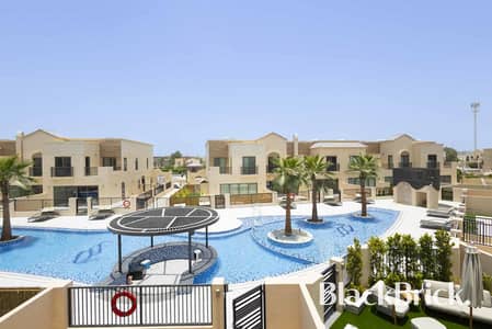 3 Bedroom Townhouse for Sale in Jumeirah Golf Estates, Dubai - Direct Pool Unit | Sun set Facing Garden