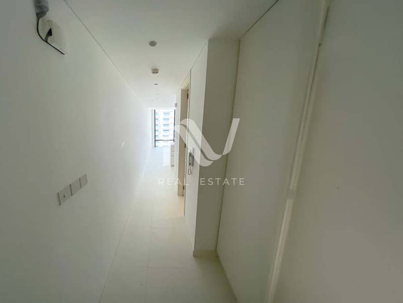 7 Rdk Towers 1BR, Al Reem Island - NV25062025YA02R_0007_Brightness_Contrast 8. jpg