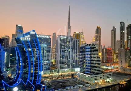 1 Bedroom Apartment for Sale in Business Bay, Dubai - Burj Khalifa & Canal view | Furnished | Semi Closed Kitchen