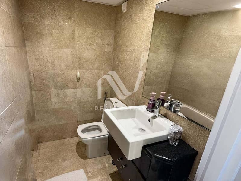 7 Ocean Terraces Residences 2BR, Al Reem Island - 131521216701_0004_remove 5. jpg