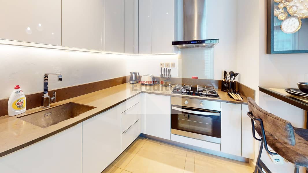 3 Gulf-Course-And-Marina-View-Mg1-1bhk-Kitchen. jpg