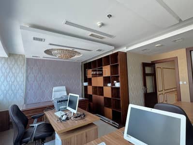 Office for Rent in Business Bay, Dubai - Canal and Burj Khalifa View | Nicely Furnished