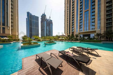 فلیٹ 1 غرفة نوم للايجار في الخليج التجاري، دبي - pool. jpg