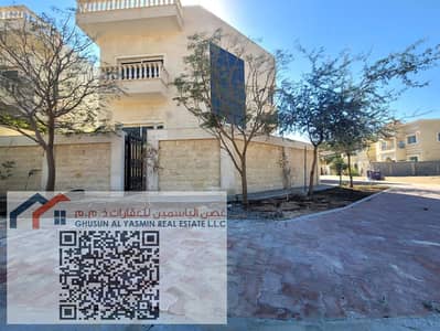 For rent a villa in Al Muwaihat 2, five master bedrooms, a hall, a sitting room, two kitchens, and an indoor swimming pool on the ground floor, at the
