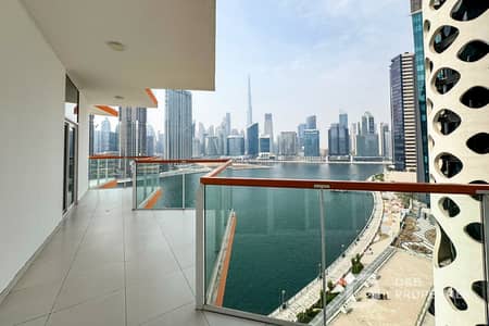 2 Bedroom Apartment for Rent in Business Bay, Dubai - Canal and Burj View | Available Now | Unfurnished