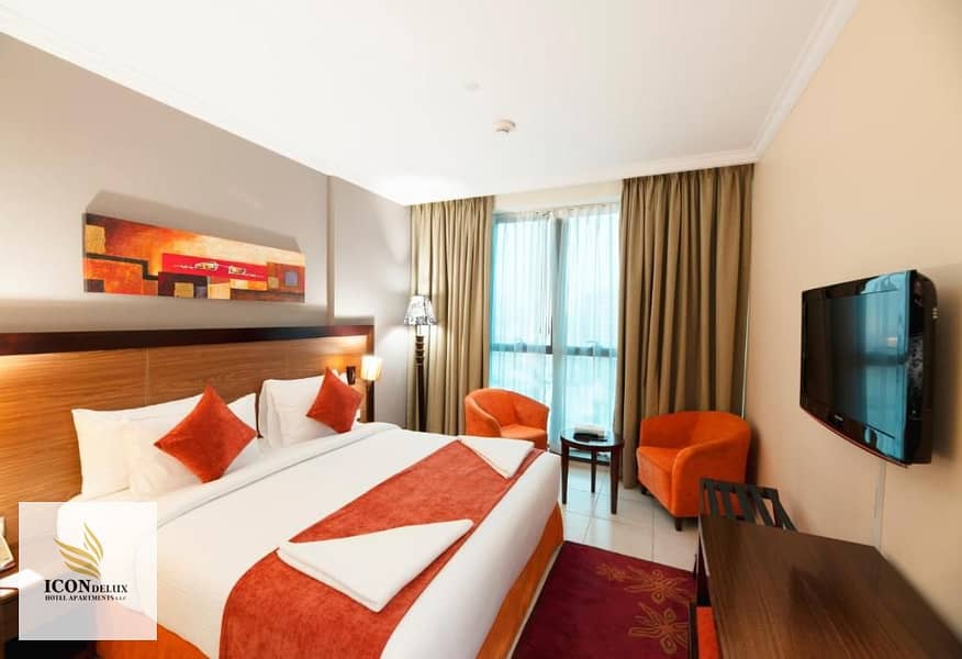 3 DLX SUITE 2BR MASTER BEDROOM. jpg