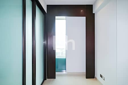 1 Bedroom Apartment for Rent in Business Bay, Dubai - Study Room | City & Canal View | Low Price