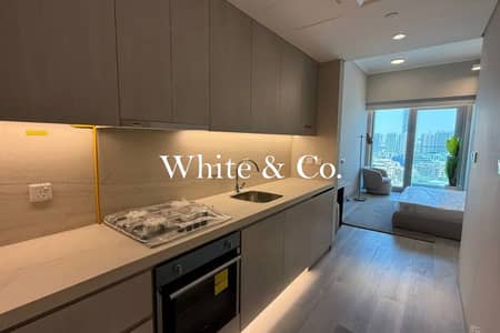 Studio for Rent in Jumeirah Village Circle (JVC), Dubai - High Floor | Pool View | Fully Furnished