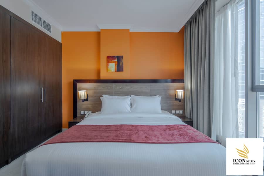 5 DLX SUITE 1BR MASTER BED2. jpg