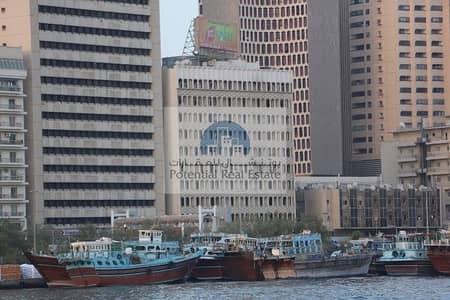 Office for Rent in Deira, Dubai - Studio office AC free - Near Metro Creek Street - 30,000 + 1 month - China Tower