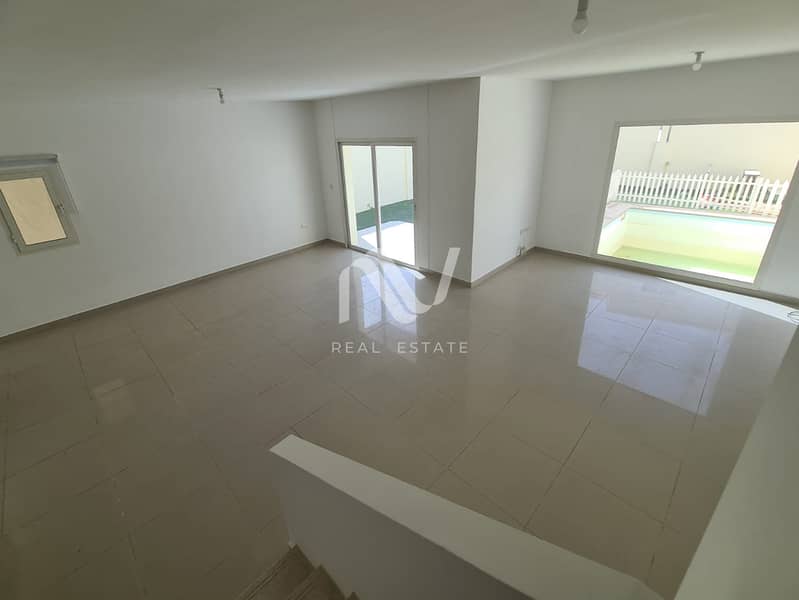 4 Arabian Style Al Reef Villas _0027_Background. jpg
