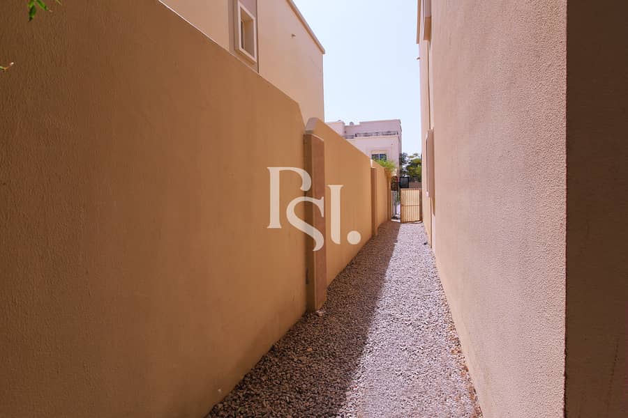11 4-bedroom-villa-abu-dhabi-al-reef-arabian-village-backyard-1. JPG