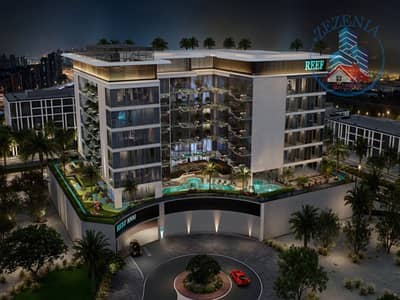 شقة 1 غرفة نوم للبيع في مجمع دبي لاند ريزيدنس، دبي - REEF_1000_DLRC_NIGHT_REAR_VIEW. png