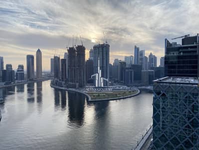 Studio for Rent in Business Bay, Dubai - Full Canal View | Fully Furnished | High Floor