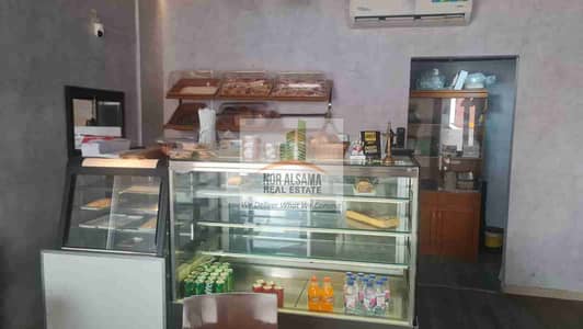 محل تجاري  للايجار في المدينة العالمية، دبي - 1000633515. jpg