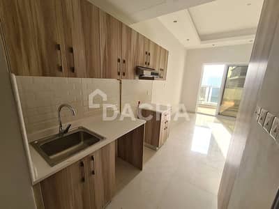 Studio for Sale in Dubai Sports City, Dubai - Modern Canal-View Unit with Balcony | Vacant Now