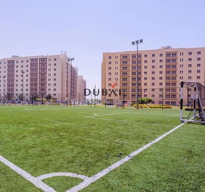 فلیٹ 2 غرفة نوم للايجار في القوز، دبي - soccer field. png