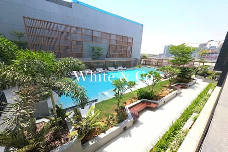1 Bedroom Flat for Rent in Jumeirah Village Circle (JVC), Dubai - Pool View | Flexy Cheques | 2 Weeks Free