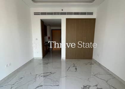 Studio for Rent in Meydan City, Dubai - Phase 4 | High Floor | Kitchen Appliances w/ Oven