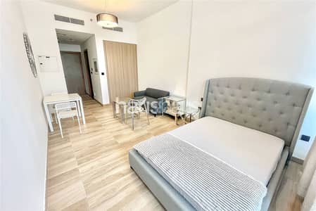 Studio for Rent in Dubai Studio City, Dubai - Swimming Pool View | Fully Furnished | Vacant Now