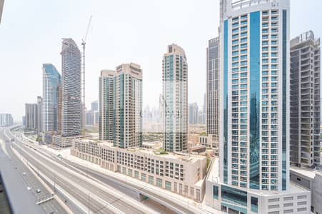 استوديو  للايجار في الخليج التجاري، دبي - شقة في ماج 318،الخليج التجاري 75000 درهم - 12206363