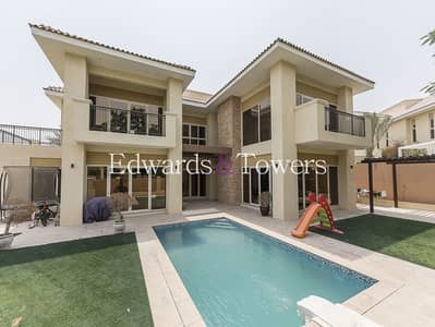 5 Bedroom Villa for Rent in Jumeirah Golf Estates, Dubai - Five Bedrooms | Big Garden | Three Car Garage