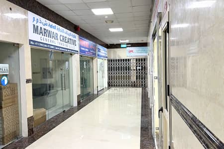 محل تجاري  للايجار في بر دبي، دبي - khurram shop (1). png