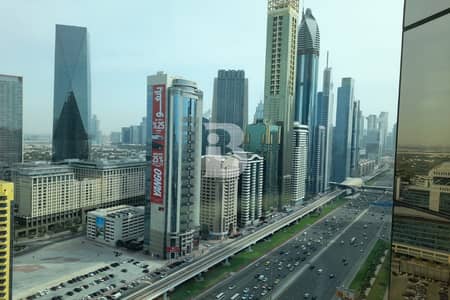 مکتب  للايجار في شارع الشيخ زايد، دبي - مکتب في برج بارك بليس،شارع الشيخ زايد 402500 درهم - 12229043