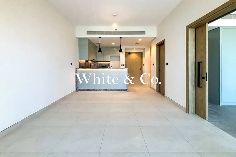 位于达马克山庄，高尔夫之门社区 1 卧室的公寓 1250000 AED - 12230191