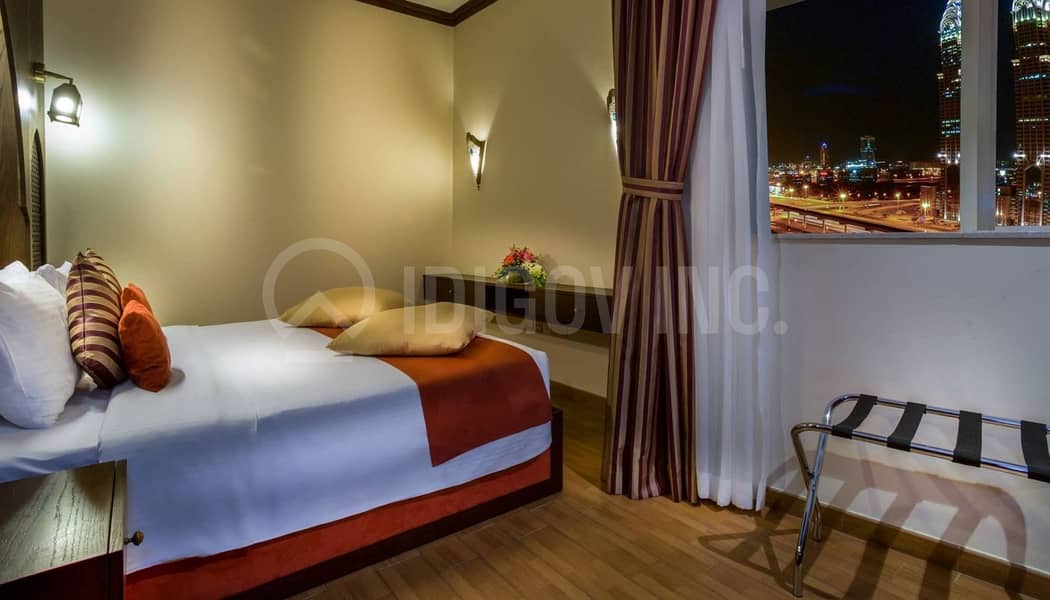 2 Classic-One-Bedroom-Suite-First-Central-Hotel-Suites-1400x800. jpg