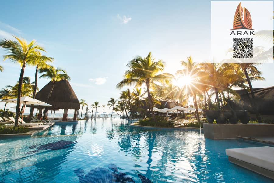 16 swimming-pool-among-palm-trees-on-a-tropical-islan-2022-02-12-05-47-40-utc. jpg