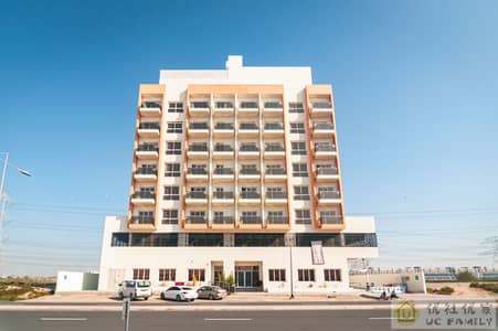 Studio for Rent in International City, Dubai - Building-2. jpg