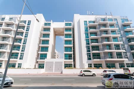 Studio for Rent in International City, Dubai - Building-6. jpg