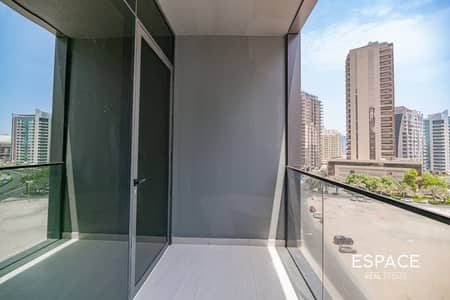 Studio for Rent in Dubai Sports City, Dubai - Canal View | Vacant | Unfurnished