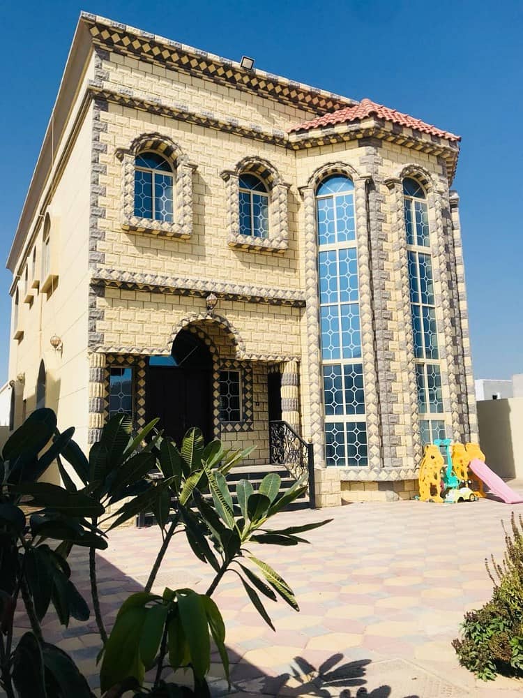 Close to Sheikh Ammar street stone facade Villa for sale in Ajman Super Deluxe
