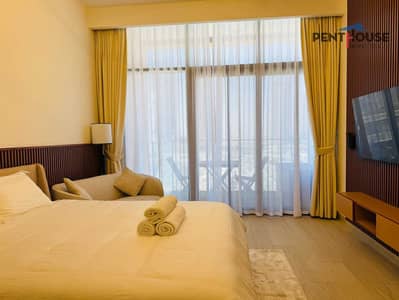 Studio for Rent in Meydan City, Dubai - Designer Furnishing|High Floor | Burj &Lagoon