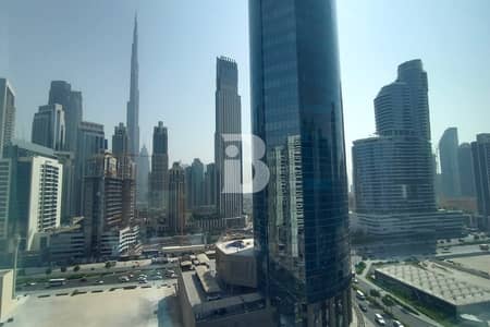 Office for Rent in Business Bay, Dubai - Fitted Office | Burj Khalifa View | Partitioned