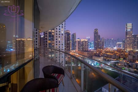 فلیٹ 2 غرفة نوم للايجار في وسط مدينة دبي، دبي - Balcony 1 n. jpg