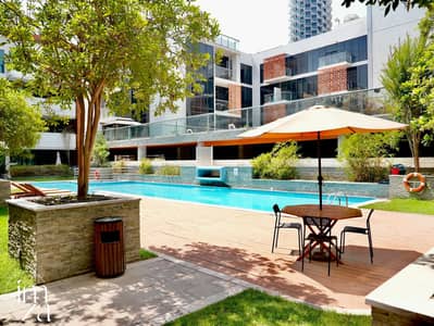 2 Bedroom Apartment for Sale in Jumeirah Village Circle (JVC), Dubai - Expansive 2BR Duplex | Pool & Community View